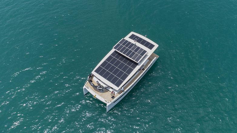 This Innovative New Solar-Powered Catamaran Uses a Giant Kite for Even More Speed