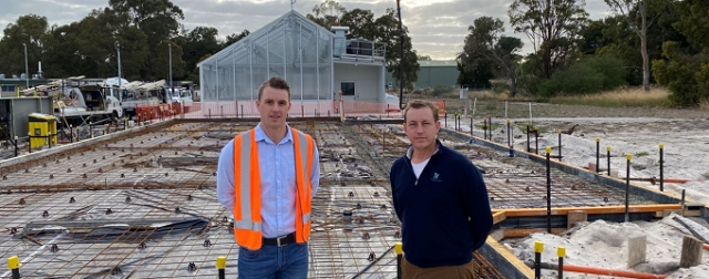 Construction begins on solar glass greenhouse