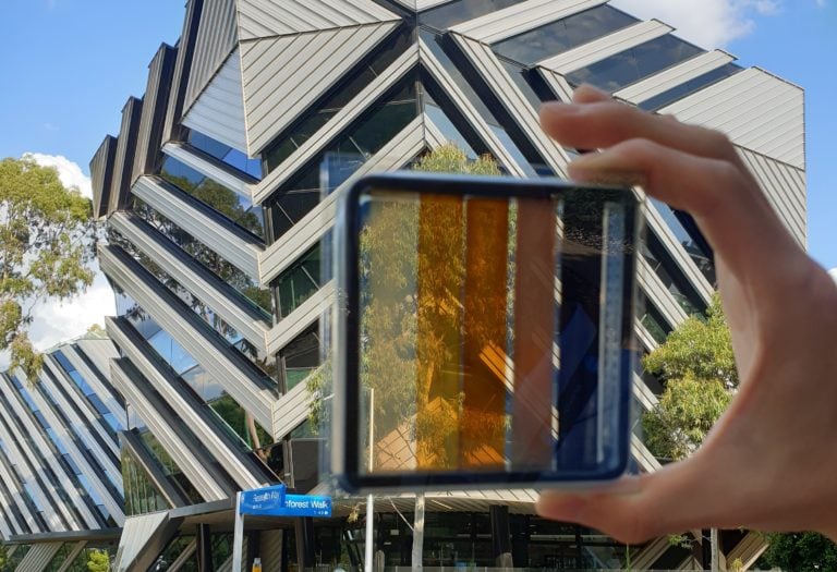 Semi-transparent perovskite solar cell for window applications